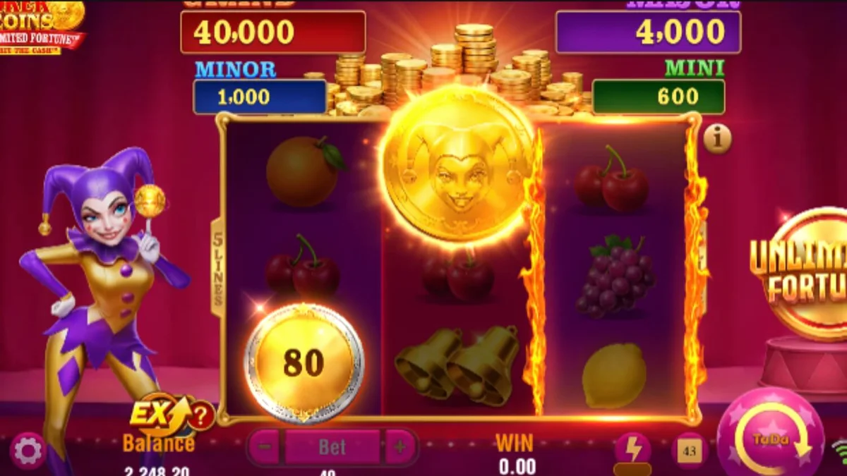 Tampilan layar permainan slot Joker Coins Unlimited Fortune dengan simbol buah dan koin emas